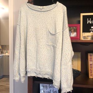 Cropped distressed sweater